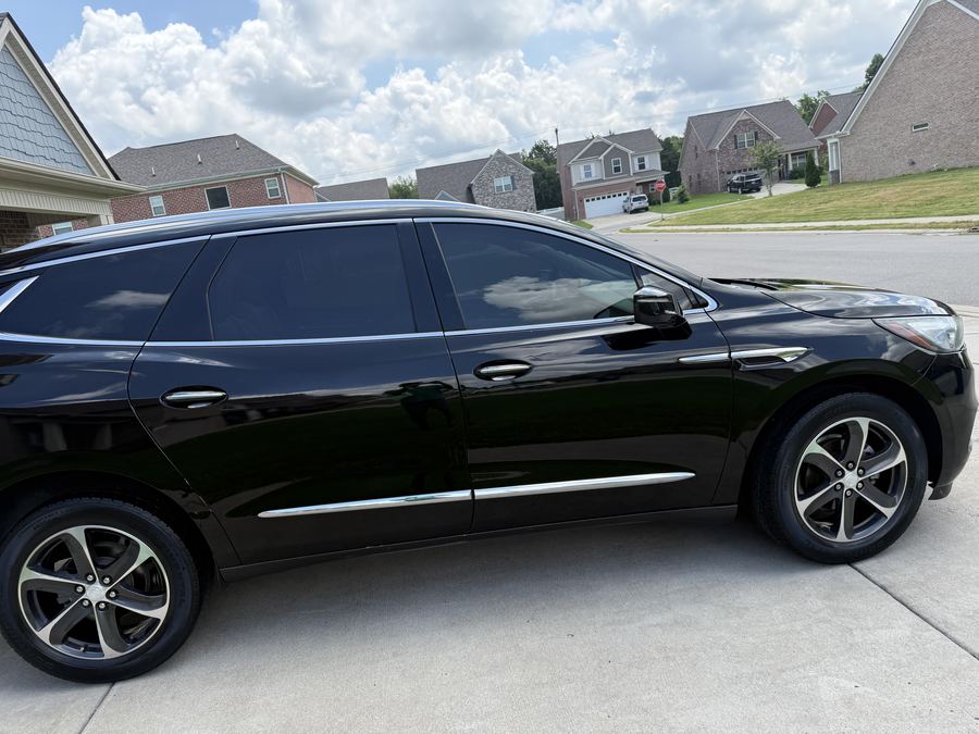 Glossy black SUV after paint correction